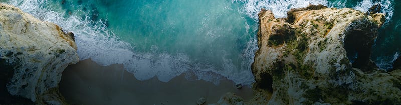 aerial view of ocean and cliffs